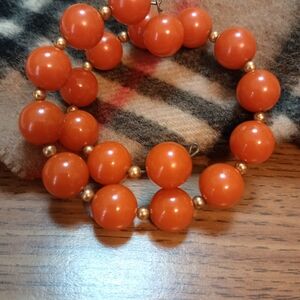 Elegant Orange Beaded Bracelet. Coil Bake Lite